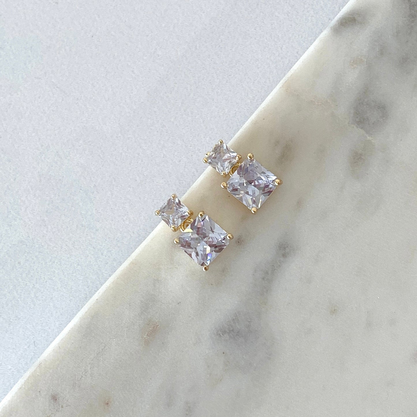 Aretes brillos doble dorado