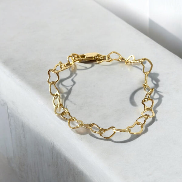 Pulsera corazones silueta