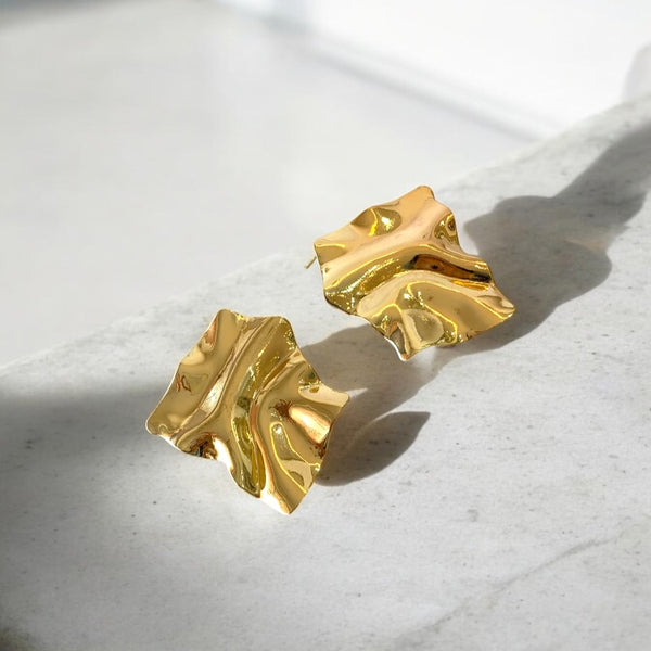 Aretes maxi pliegues