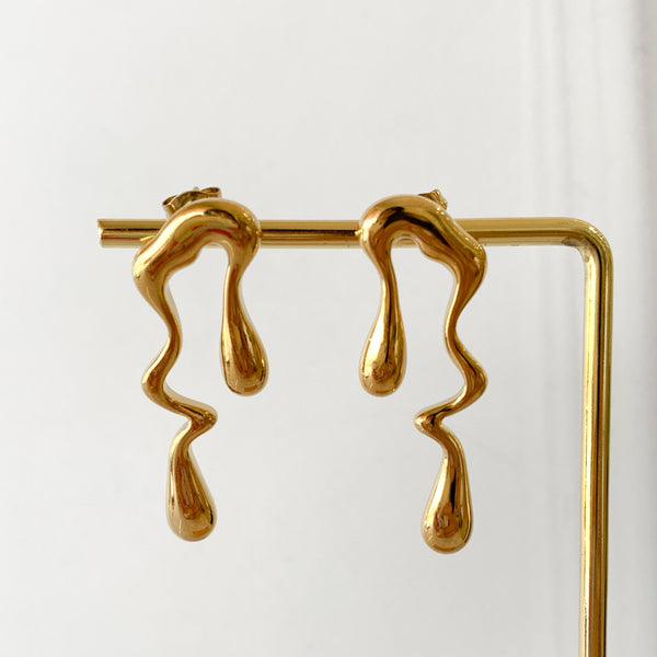 Aretes derretidos acero inoxidable