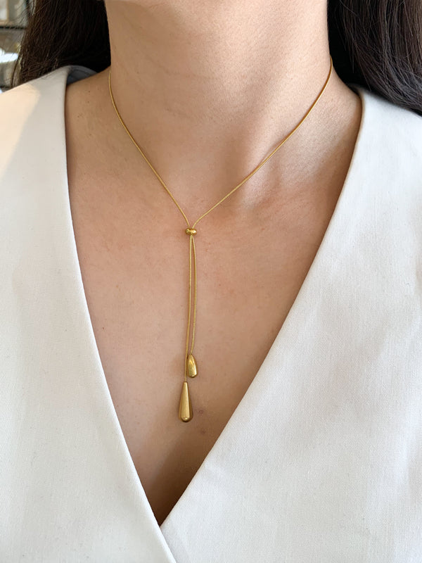 Collar corbatín dos pendulos