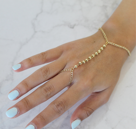 Hand chain bolitas doradas