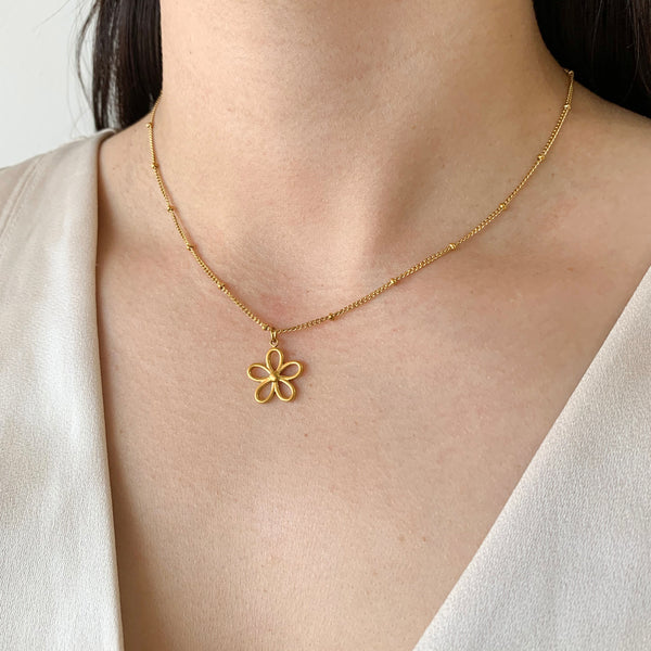 Collar flor silueta