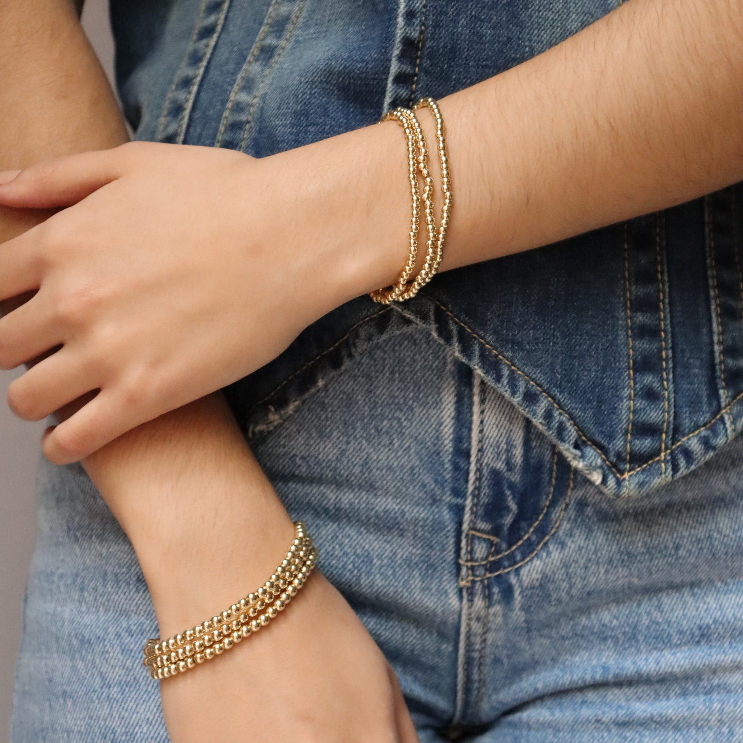 Pulsera bolitas doradas