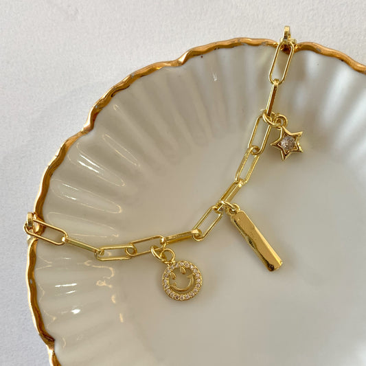 Pulsera charms carita feliz