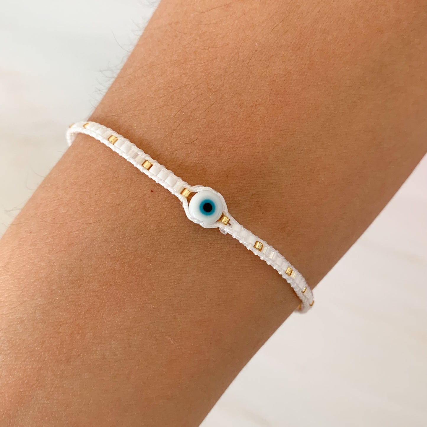 Pulsera hilo ojito